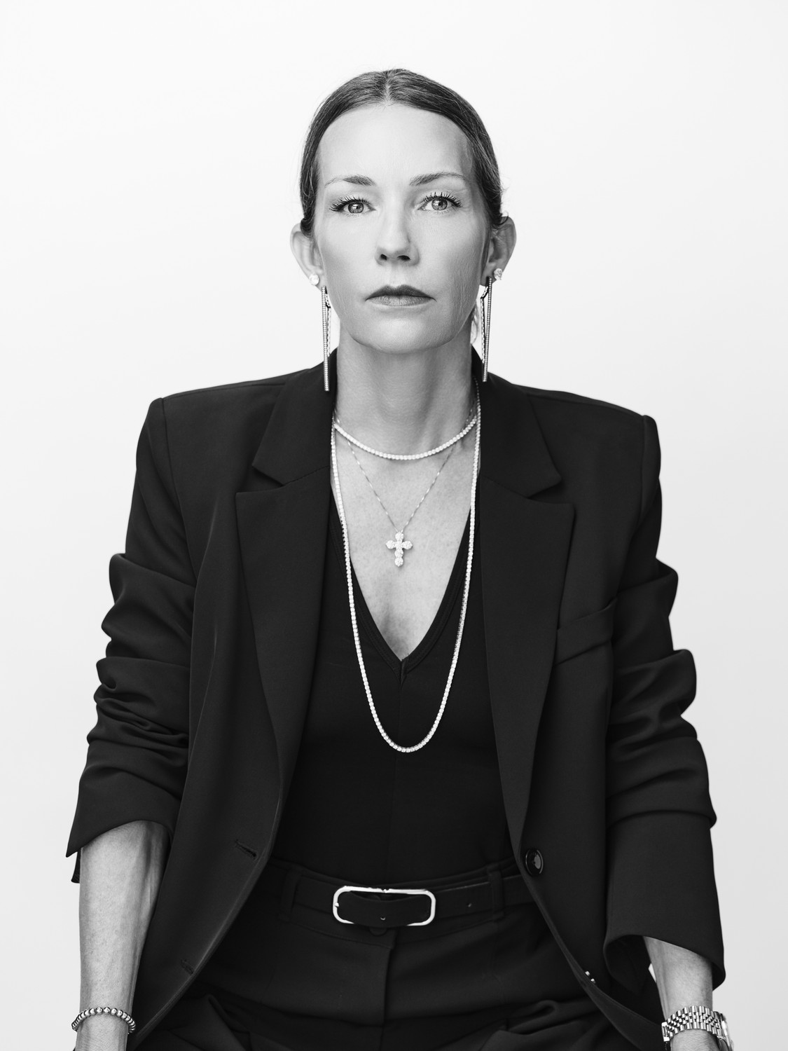 Natalie Piccola portrait — black blazer, direct gaze